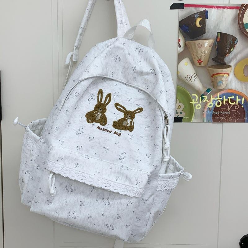 Schoolbag schoolbag new fashion versatile backpack cartoon backpack women large capacity travel commuter middle and high school student schoolbag