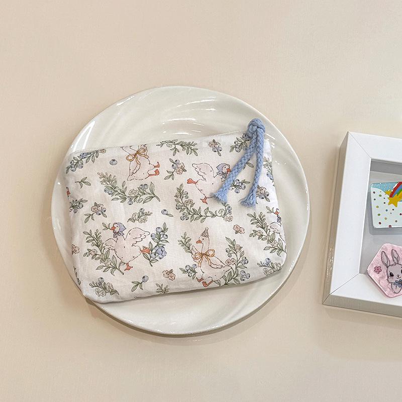 Adorable Blue Cartoon Makeup Bag: Mini Pure Cotton Coin and Earphone Pouch, Lipstick Carrier, Portable Storage.