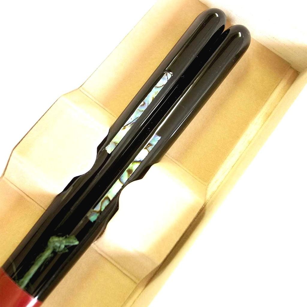 A pair of Wakasa lacquered chopsticks for featuring the presented in a paulownia wood A perfect Day retirement birthday 60th birthday or other special