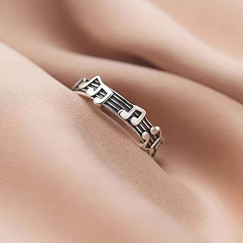 

Stunning Music Note Ring - Adjustable, Rhodium Plated, Alloy Construction, Ideal Gift for Music Enthusiasts, Perfect Accessory resizable