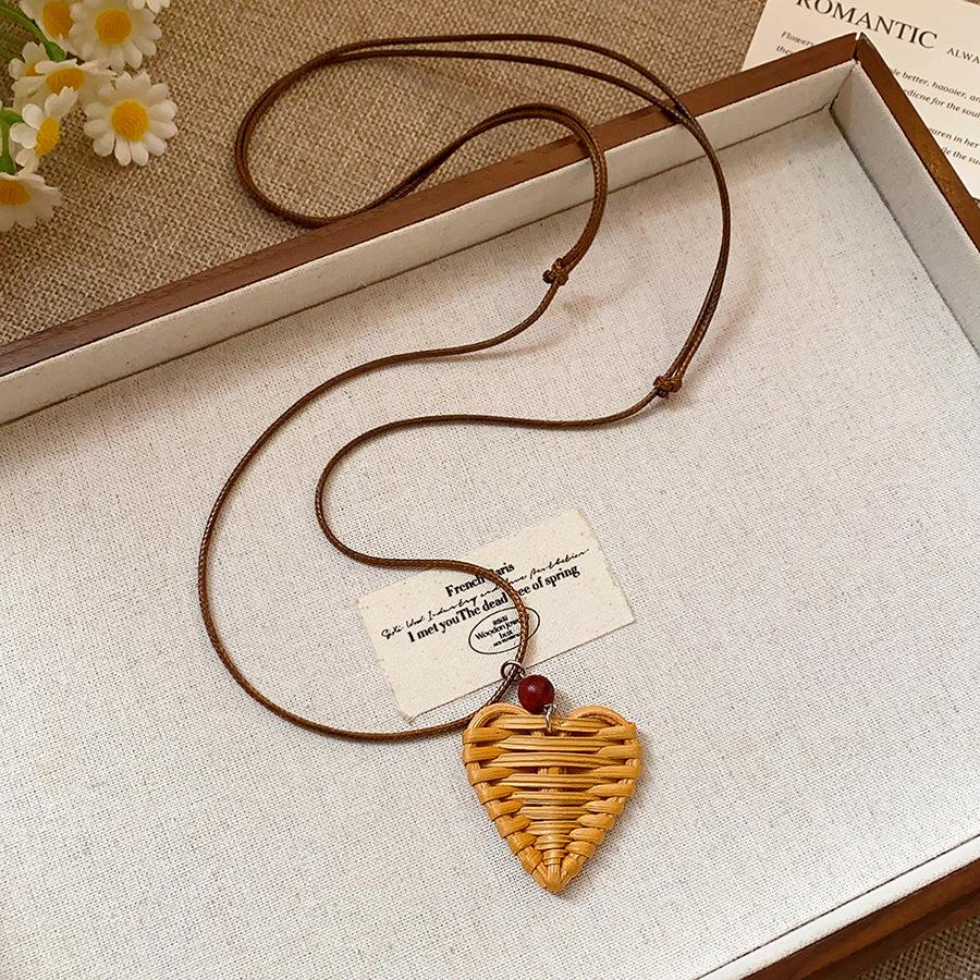 Retro Ethnic Heart Necklace: Wooden Flower Pendant Sweater Chain for Women