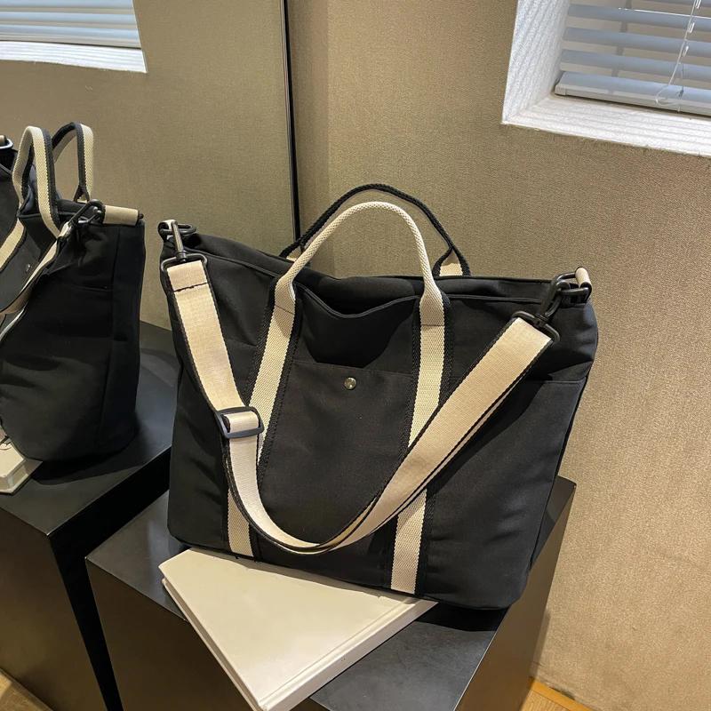 

Специальная сумка кроссбоди Новая модная женская сумка Спортивная парусиновая сумка-тоут Повседневная Большая вместительность Сумка на плечо ARI 35x13x30cm чёрный