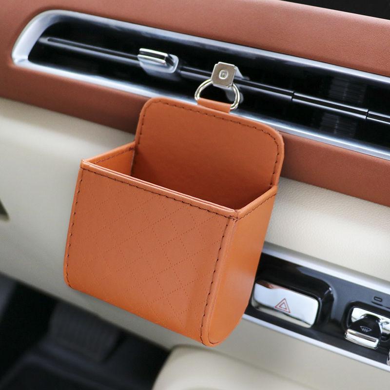 

1 шт. сумка для хранения автомобиля, автомобильный воздухозаборник, мусорный мешок для мобильного телефона, ключа, солнцезащитных очков, вентиляционное отверстие, приборная панель, подвесной кожаный органайзер, коробка 1PCS коричневый