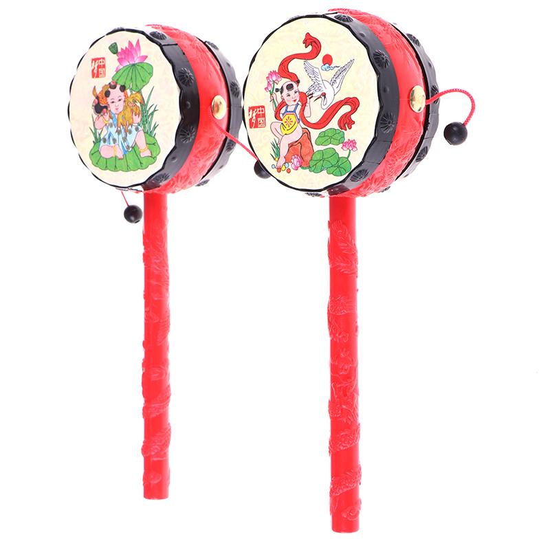 1PCS Baby Kids Cartoon Plastic Chinese Traditional Rattle Drum Spin Fun Toys Hand Bell Music Toys