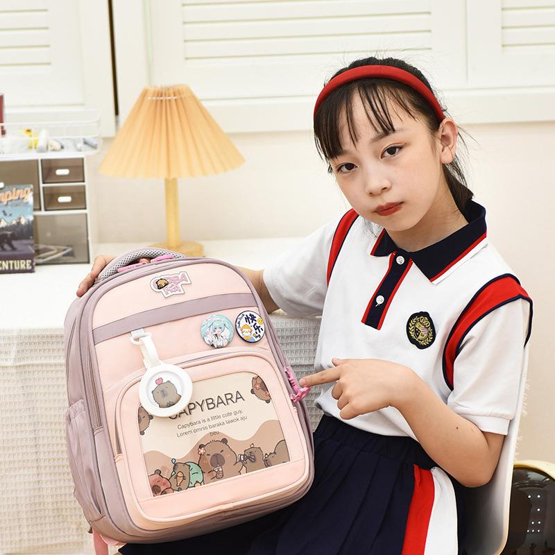 Children's school bag, new cartoon backpack, primary school bag, large-capacity load-reducing ridge backpack, cross