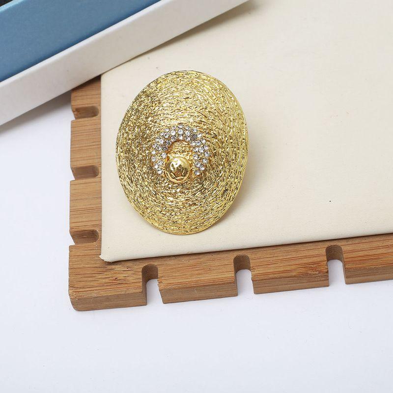 European and American Retro Niche Design Water Ripple Texture Asymmetric Oval Earrings Minimalist Exaggerated Ear Studs Gold Ring