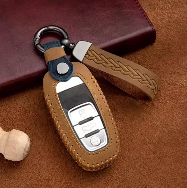 

Кожаный чехол-накладка для ключа автомобиля для A1 A3 8V A4 B8 B9 A5 A6 C7 A7 A8 Q3 Q5 Q7 S4 S6 S7 S8 R8 TT Защитная оболочка для ключа автомобиля коричневый