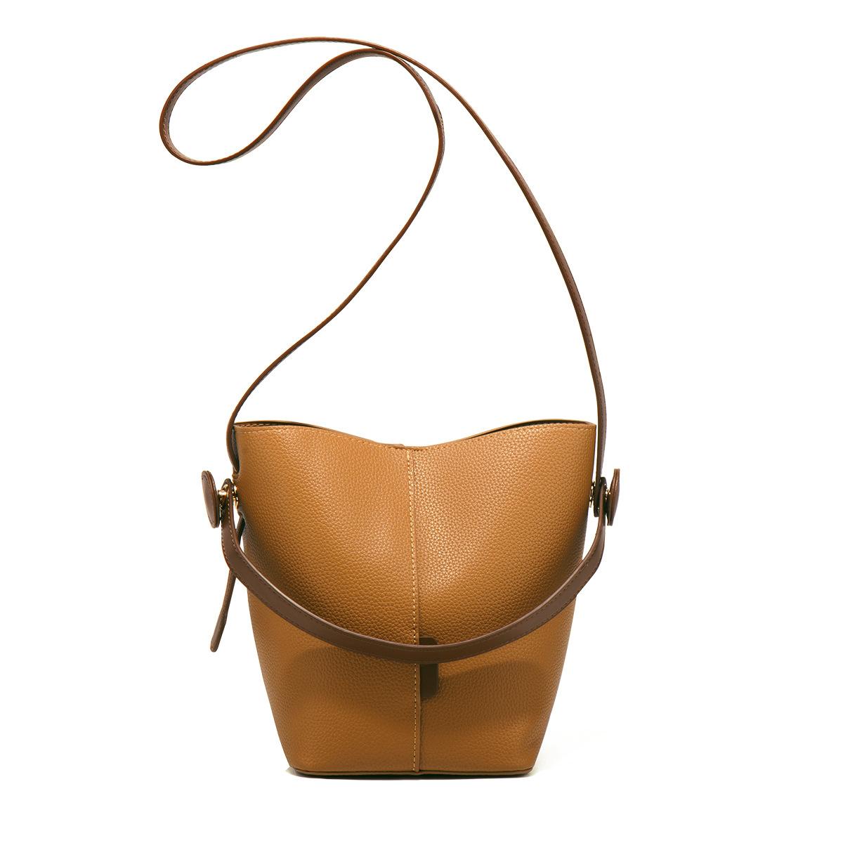 

Small bucket bag women s high-end bag 2025 new niche vegetable basket women s bag super hot portable messenger bag summer темно-коричневого