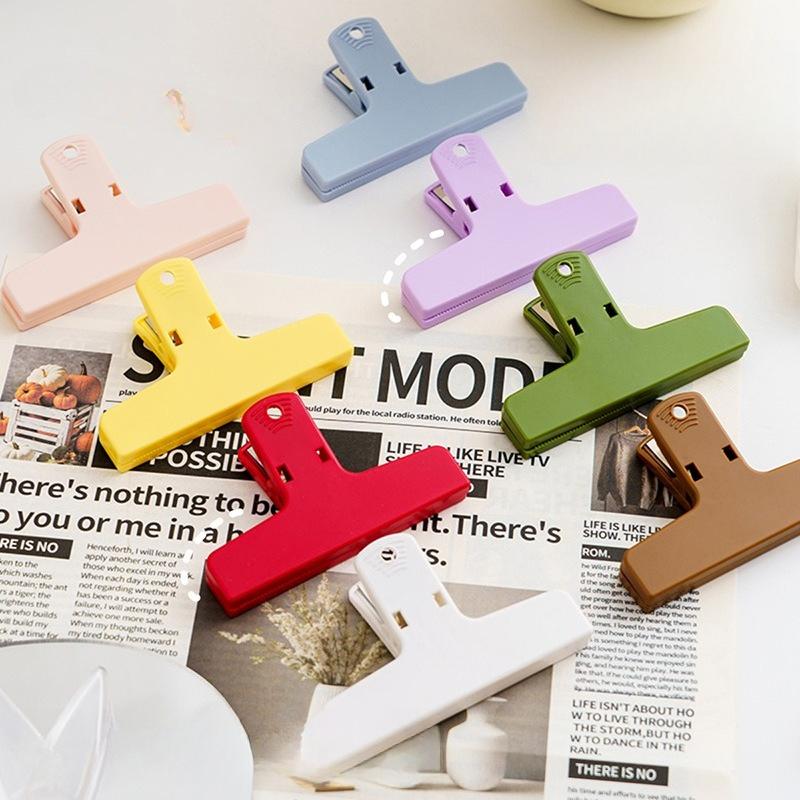 1-1 pieces of colored clips that can be used to hang magnetic-inside-inside office file storage clips and sticky note clips