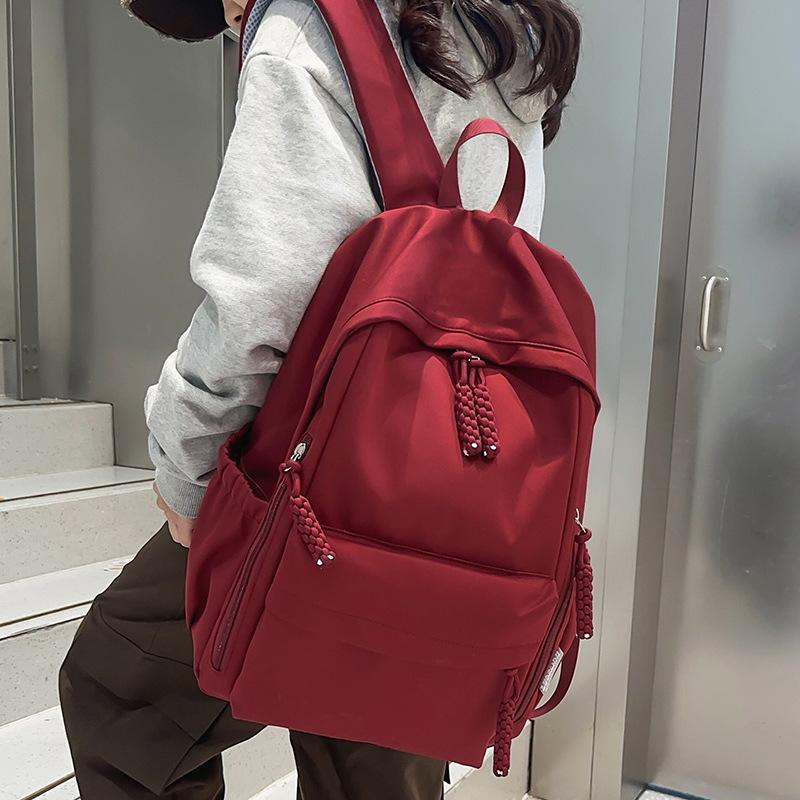 School bag children, elementary school students, girls, junior high school students, high school simple solid color college students, backpack,