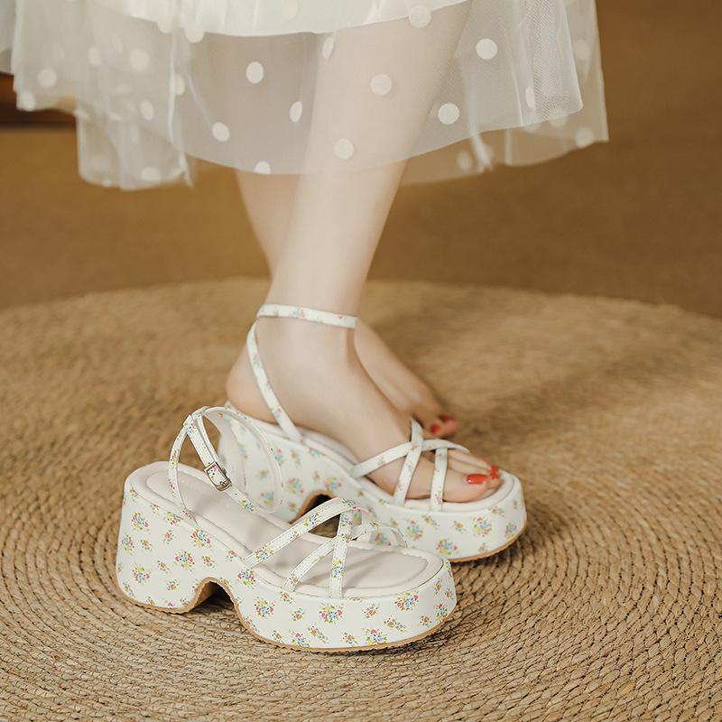 Sweet and cool wind thick-soled wedge sandals women's height increase 7cm muffin waterproof table one-word buckle belt summer new Roman shoes