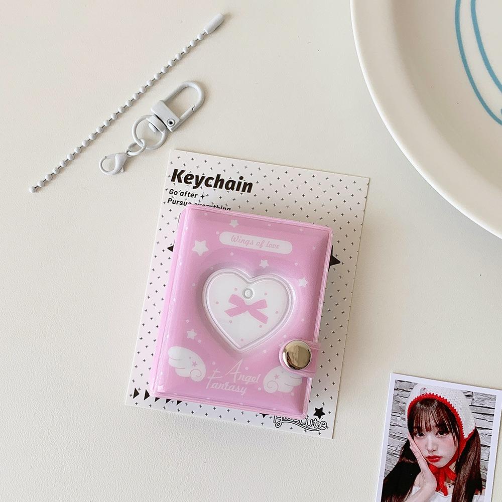 

Durable 2-inch Card Storage Photocard Holder Wings Patterns With Keychain Kpop Idol Card Binder Photo Album рожевий