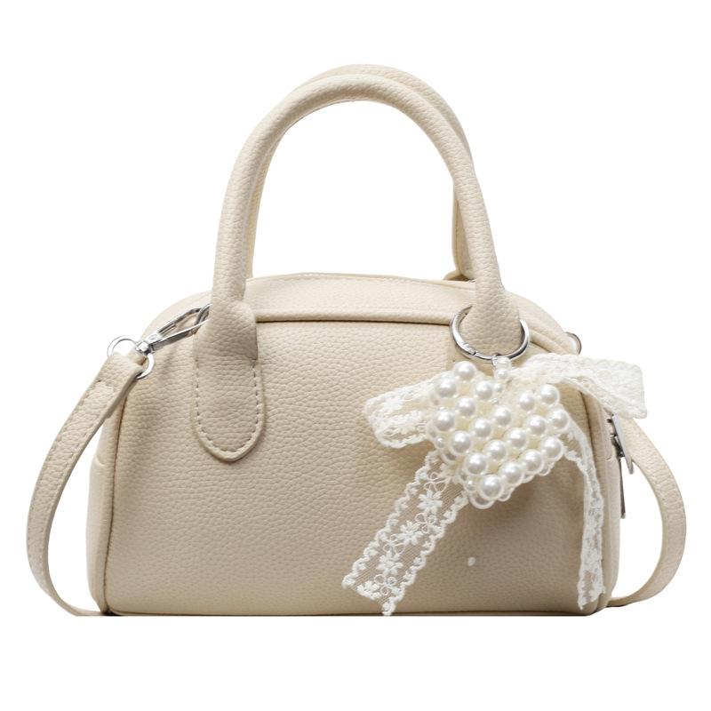 Korean Version of Simple and Gentle Wind Super Fire Solid Color Portable Bowling Bag Women's Versatile Fashion Temperament Commuter Messenger Bag