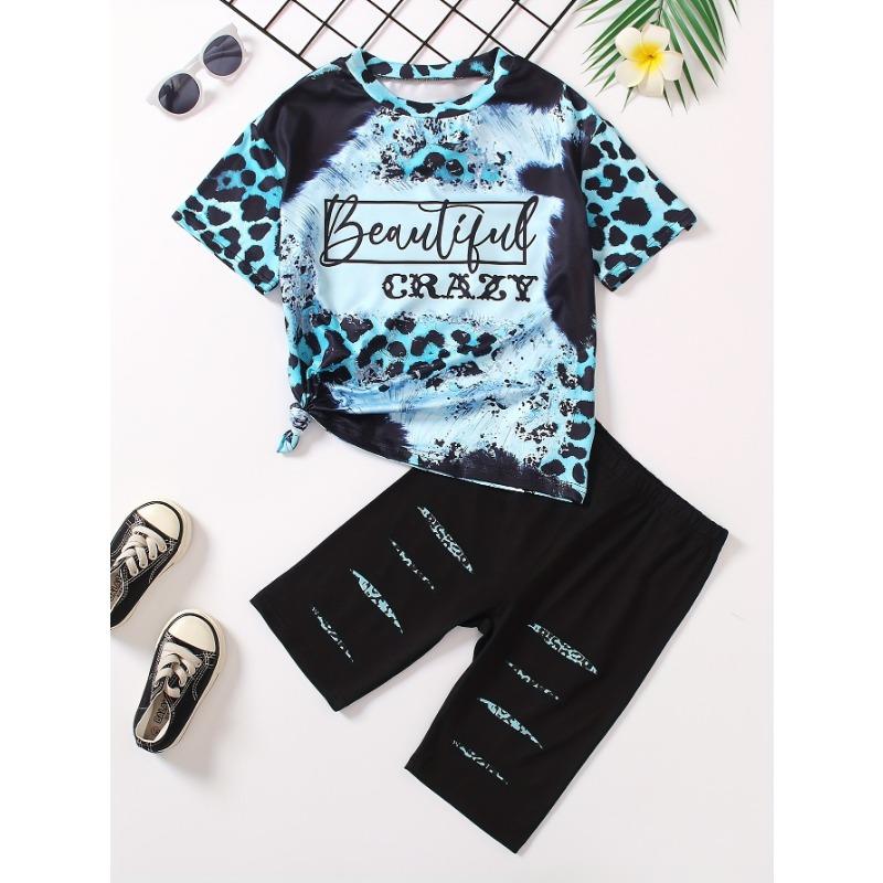 

Комплект повседневной одежды из двух предметов с леопардовым принтом для девочек - мягкая, дышащая и удобная футболка + стильные шорты-бермуды - идеальный вариант для повседневной летней одежды. 120