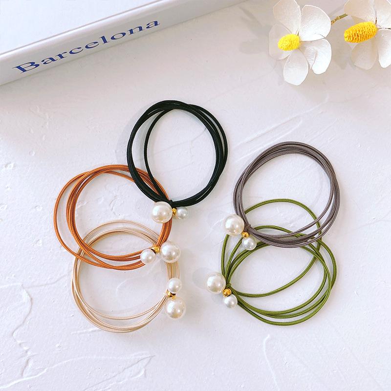 Elegant Korean Pearl Knot Hair Tie - High Elasticity Rubber Band Accessory.