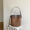 Autumn and Winter New Suede Bag Retro Cylinder Bucket Bag Women's Niche Leather Buckle Portable Shoulder Bag