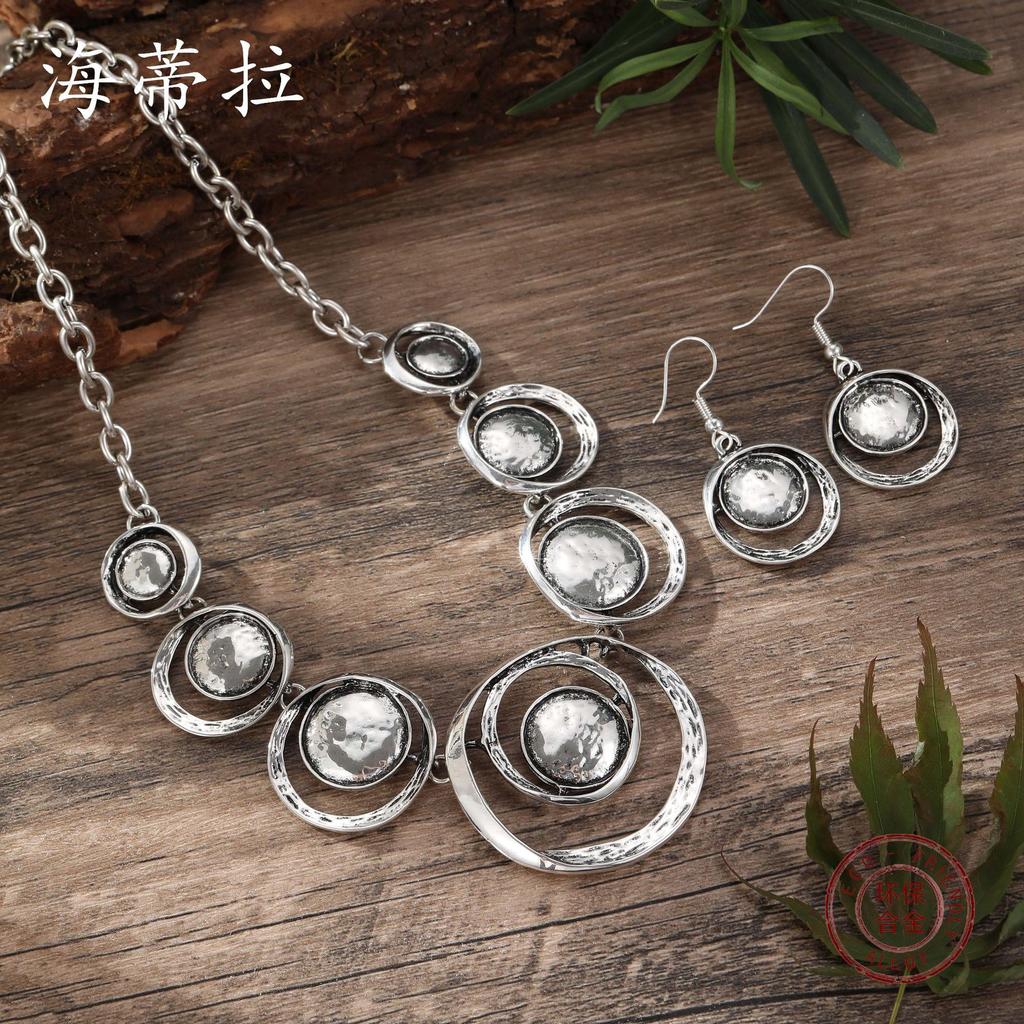 Nowy retro ażurowy okrągły zestaw kolczyków i naszyjnika, personalizowany zestaw kolczyków i naszyjnika w kolorze antycznego srebra