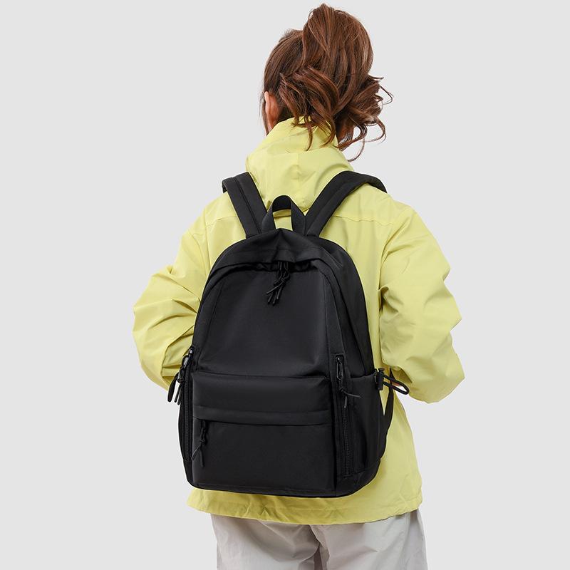 Schultasche einfacher Stil Mode Rucksack große Kapazität Mittelschule Männer und Frauen neuer Rucksack leichte Textur Schülertasche Schultasche