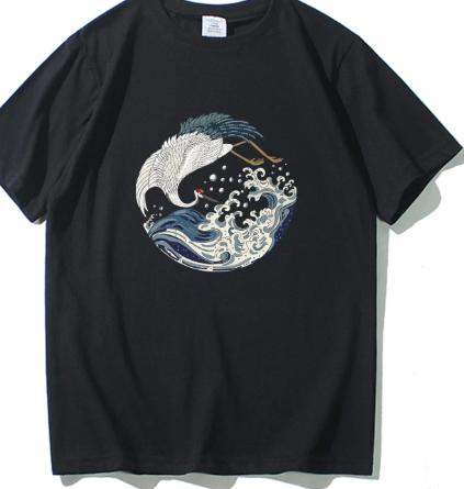 White Crane Playing In the Waves. Summer Fun Trendy Short-sleeved T-shirt. New Style Top, Suitable for Both Men and Women.
