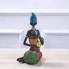 Golden Ethnic Resin Sculpture Artistic Table Decoration For Indoor Space Friendly Lightweighted Ornament