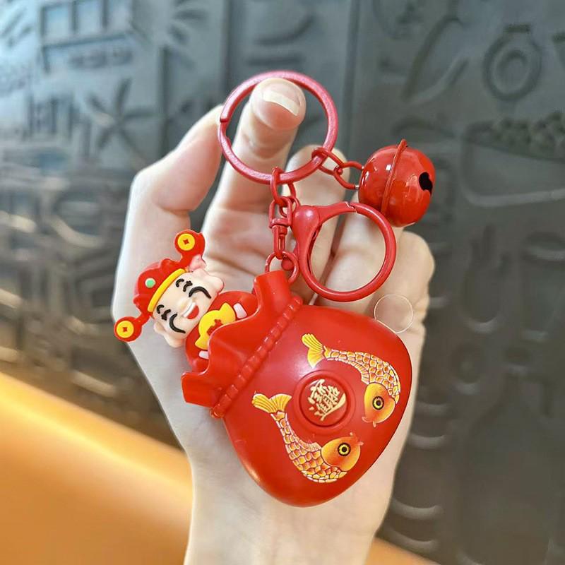 Creative New Year Keychain: God of Wealth Stress Relief Pendant & Fun Lucky Gift Bag красный