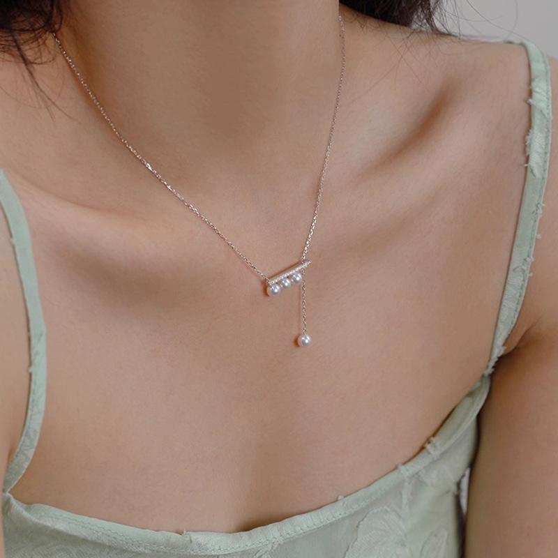 

Ожерелье из натурального пресноводного жемчуга с подвеской из четырех жемчужин и цепочкой-шнурком для ключицы 6-7mm (Round, Aurora, Near-Flawless)