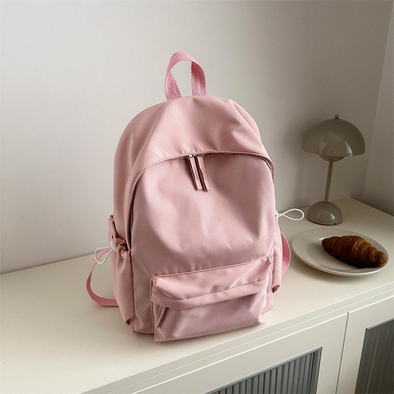 New solid color large-capacity simple casual Oxford cloth student class schoolbag men's and women's casual backpack