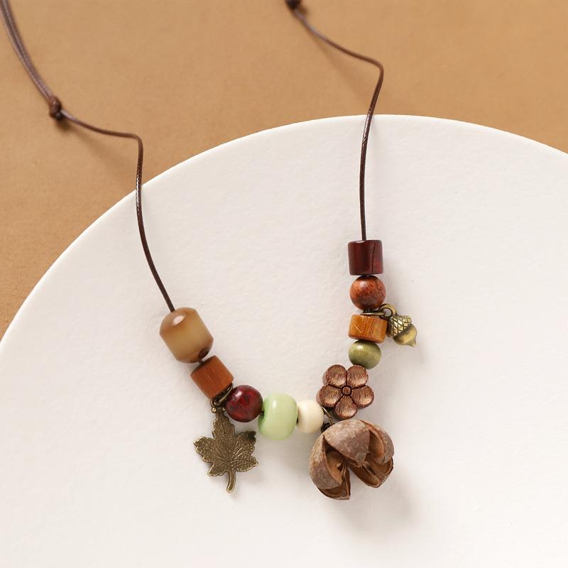 Retro literary necklace, natural plant fruit acorn pendant, long sweater chain, niche accessories