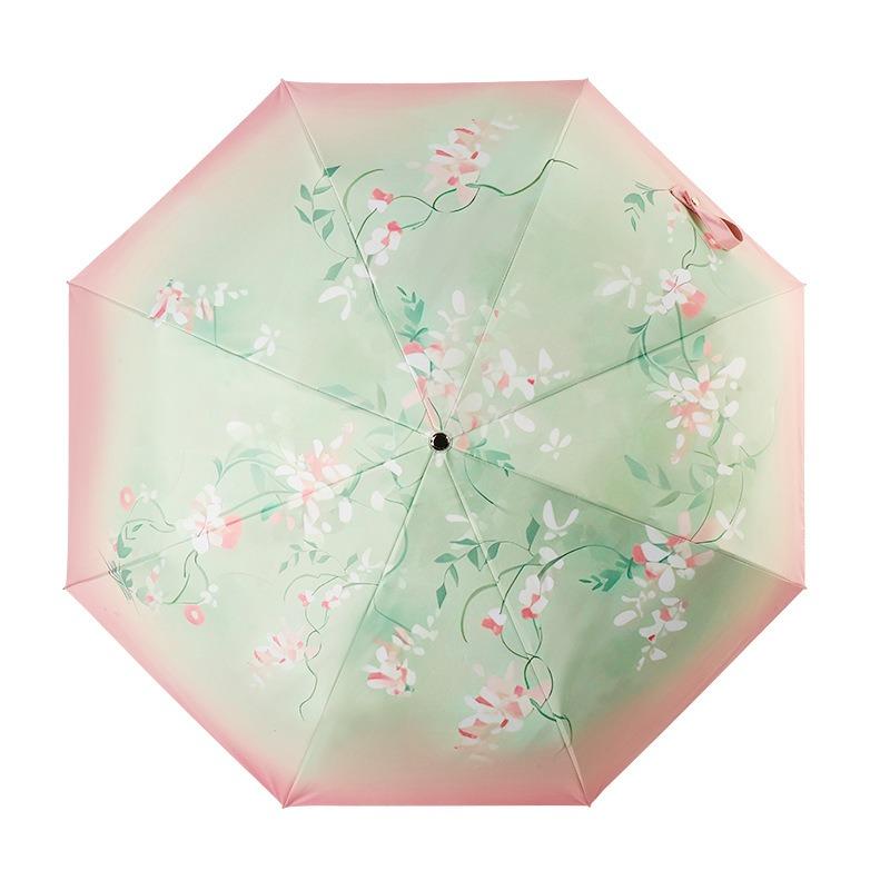 New three-fold small gold hook gold skeleton colored glue fabric gift bag umbrella weather and rain folding umbrella