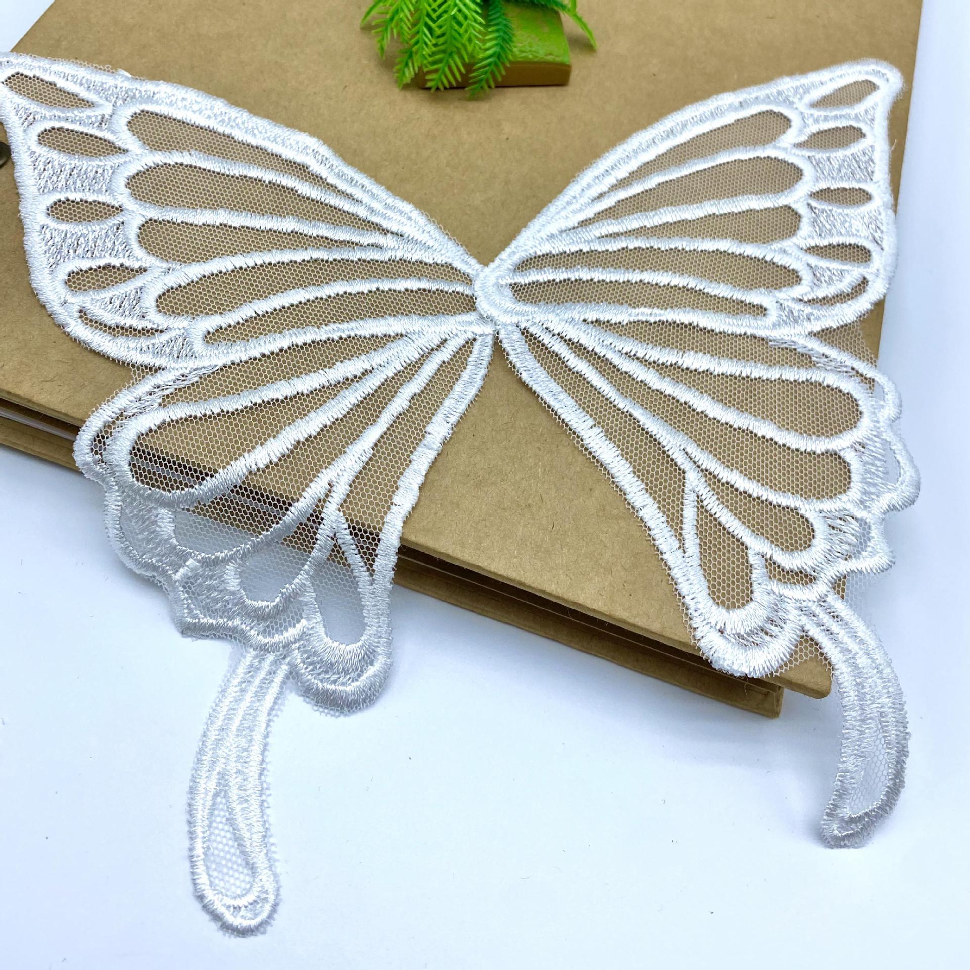 

Костюм для виступу з мереживними сітчастими крилами метелика та вишитим корсажем