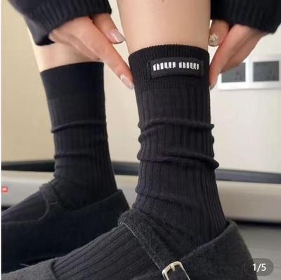 Calzini Miu Snellenti in Cotone: Nero Metà Polpaccio per Tutte le Stagioni 2025