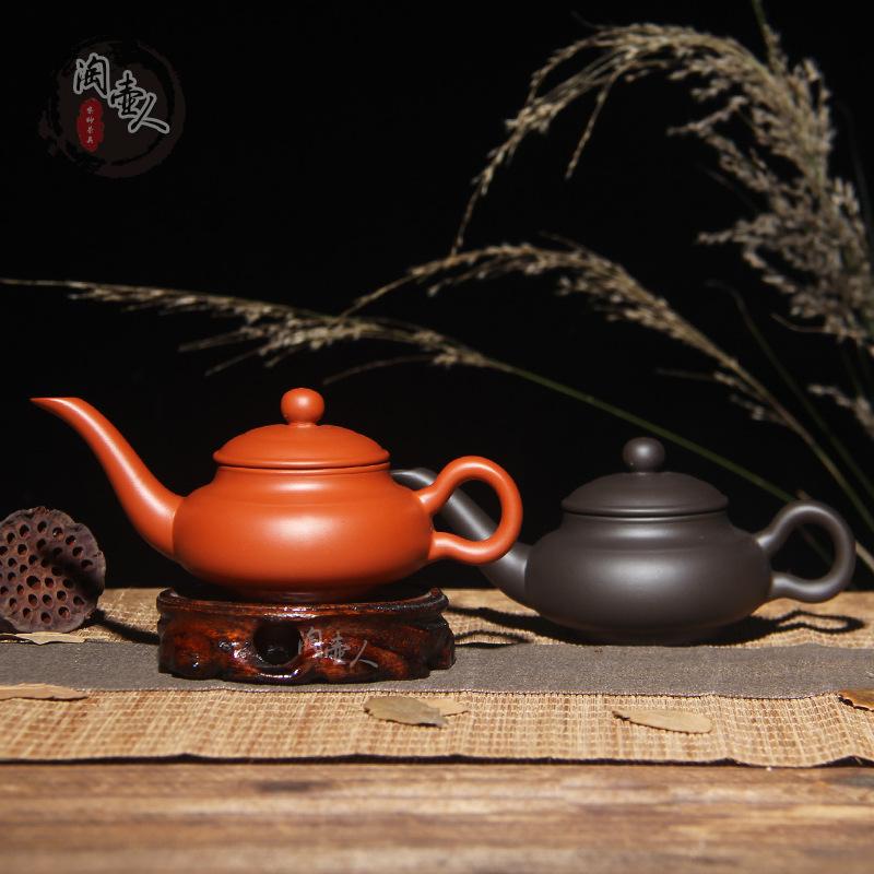 Purple sand teapot tea maker Zhu clay pot long mouth pot magic lamp pot Kung fu tea set Xi Shi small teapot hand grab pot