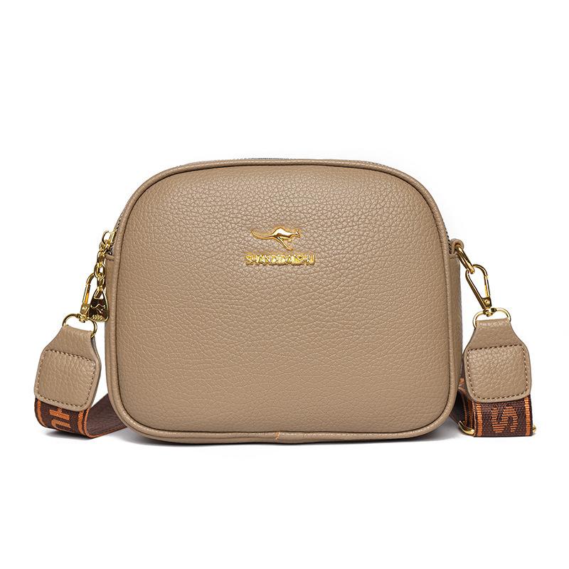 The new women's bag is simple and versatile, small round bag, multi-layer large-capacity shoulder messenger bag.