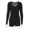 Combinaison moulante longue à manches longues taille haute rose et noire avec fermeture à boutons pour le sport