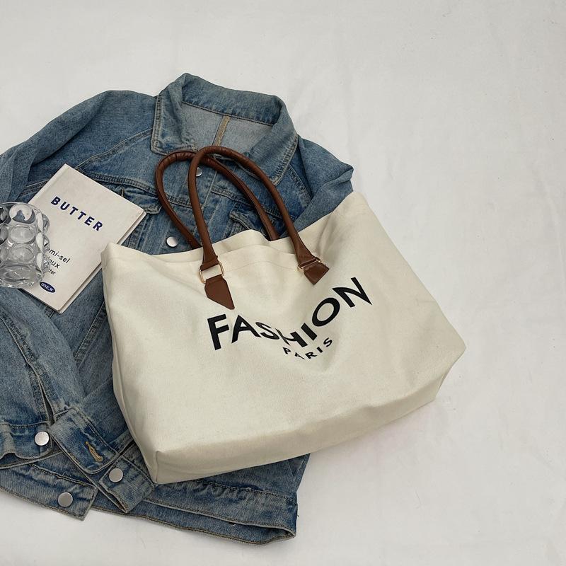 

Японская повседневная сумка-тоут для поездок на работу с надписью, новая ретро-мода 2025, большая вместимость, высокая ценность, наплечная сумка под мышку бежевый