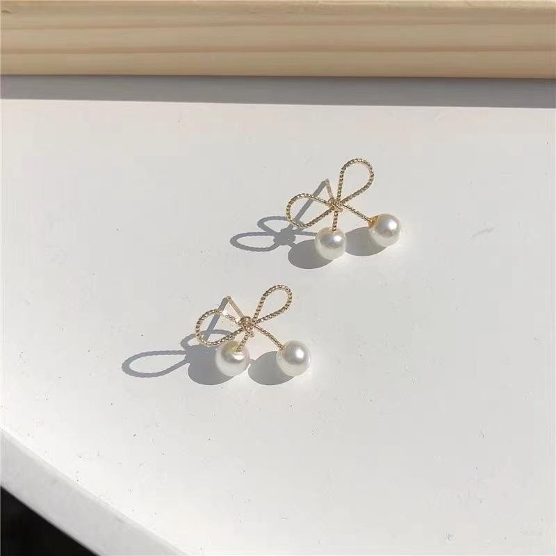 Bow pearl earrings new trendy high-end sense light luxury temperament earrings niche design stud earrings