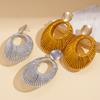 European and American personalized golden velvet woven hollow oval silver needle earrings niche earrings 