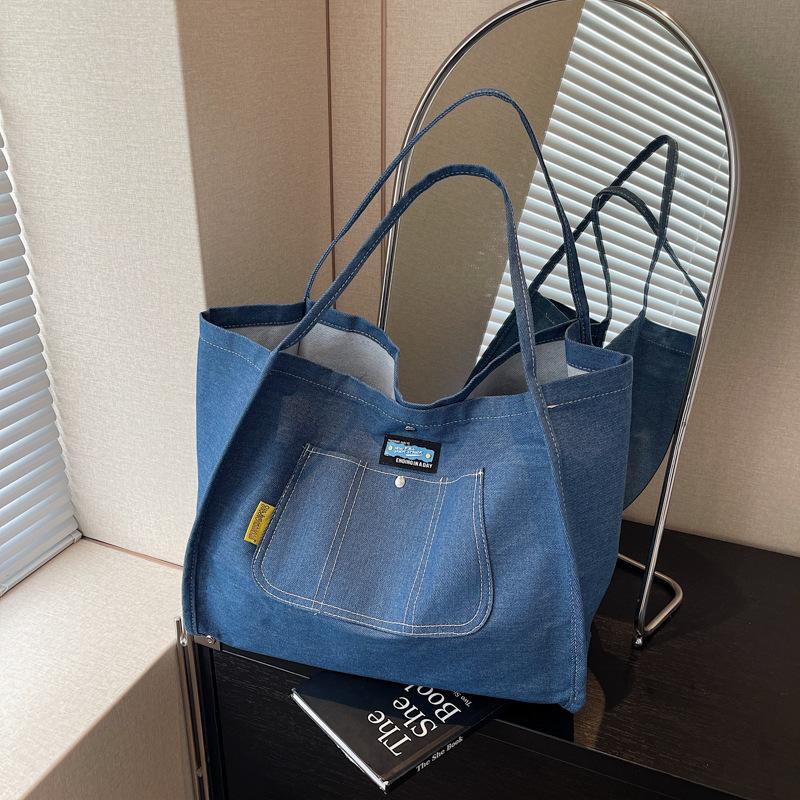 Simple and large-capacity denim tote bag women's new versatile commuter shoulder bag portable fashion shopping bag tide
