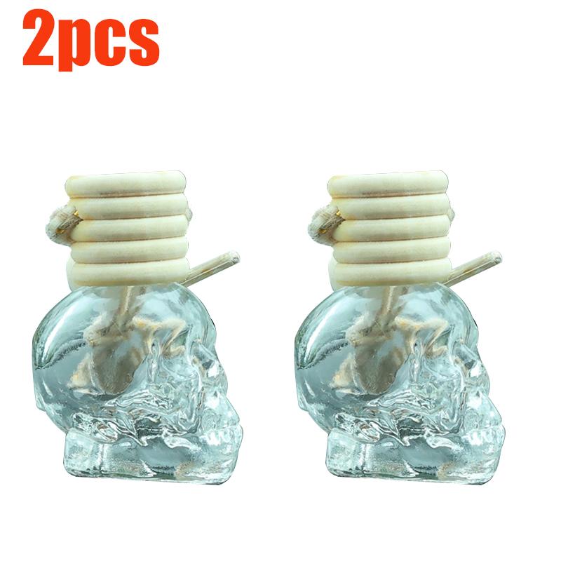 Auto-Lufterfrischer-Diffusor, Aromatherapie-Flasche mit ätherischen Ölen, zum Aufhängen, transparente Totenkopf-Parfümflasche, reinigendes Autozubehör