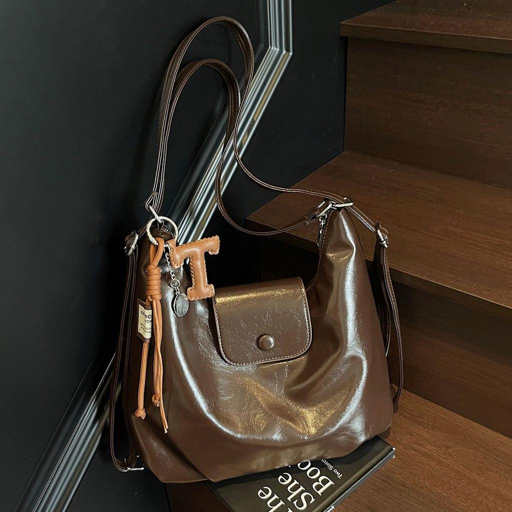 Multifunctional large-capacity messenger bag women's 2025 autumn and winter new commuter backpack high-end niche tote bag