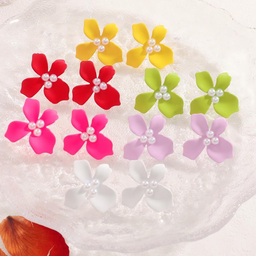European and American pearl flower stud earrings white colored petal earrings women's high sense light luxury temperament niche earrings