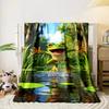 A cheerful frog is leaping energetically from water among lily pads. for all seasons blanket lunch break throw gift