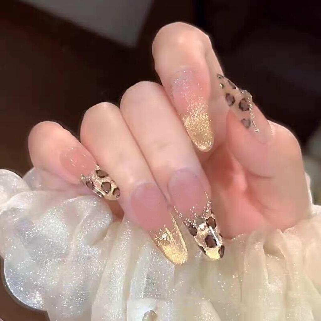 

Leopard Print Sunset Gold Glitter Cat Eye Long Almond Nails
