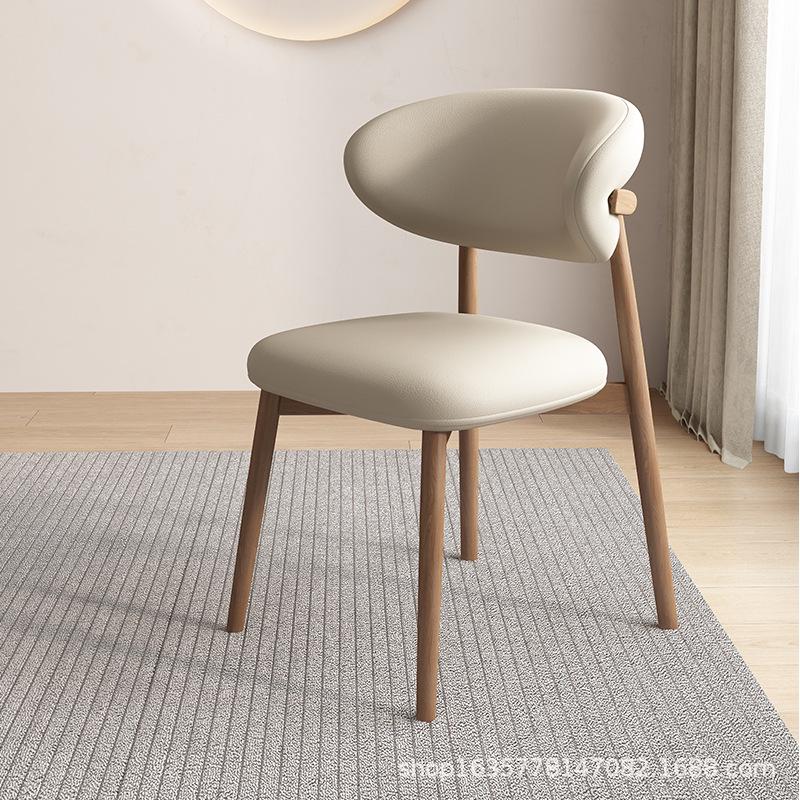 Nordic Modern Minimalist Solid Wood Dining Chair with Soft Pack Backrest - Comfortable Light Luxury Ram's Horn Design for Home, Restaurant, and Hotel.