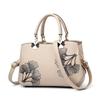 Stylish And Versatile Women's Tote Handbag With Elegant Embroidered Leaf Design