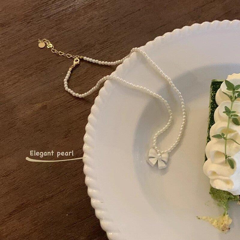 Элегантное белое колье-чокер с подвеской-бантом для женщин, ожерелье-цепочка из бусин, имитирующих жемчуг, аксессуары для элегантной леди и девушек белый
