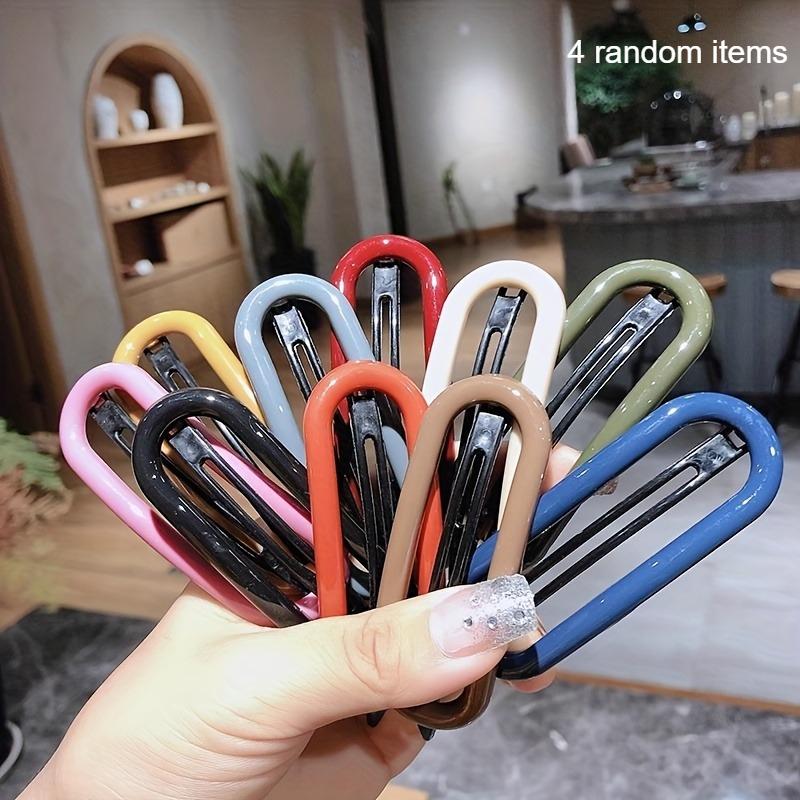 

An Exquisite Hollow Oval Hairpin, a Korean-Style Hair Accessory with a Youthful Charm, Featuring a U-Shaped Bun Frog Clip That Is Versatile for Bangs