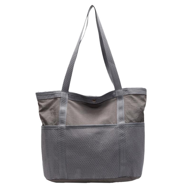 

Simple casual large-capacity tote bag women s 2025 spring new trendy commuter bag casual and lightweight shoulder bag серый