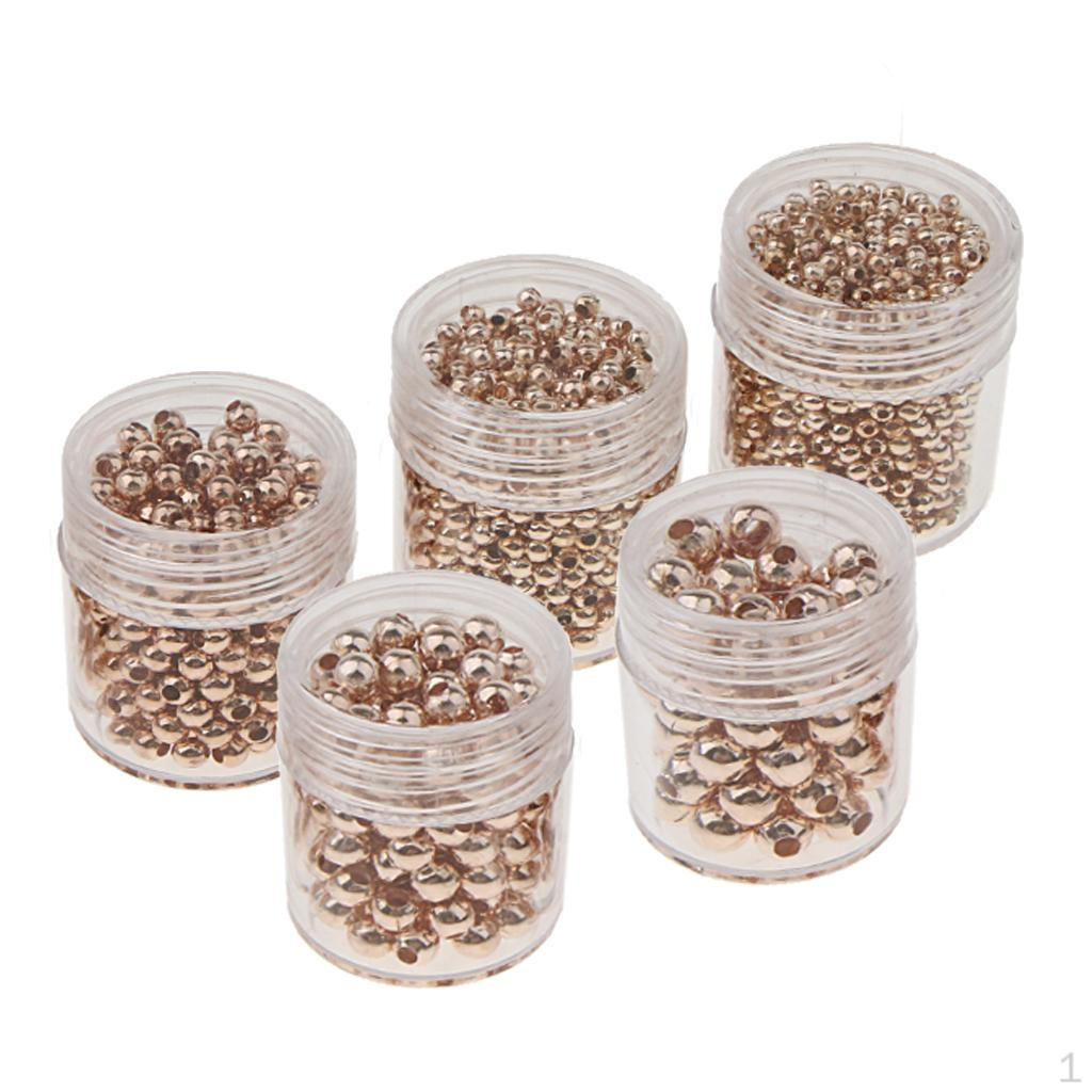 

/ Бутылки с золотыми гладкими круглыми металлическими бусинами в ассортименте