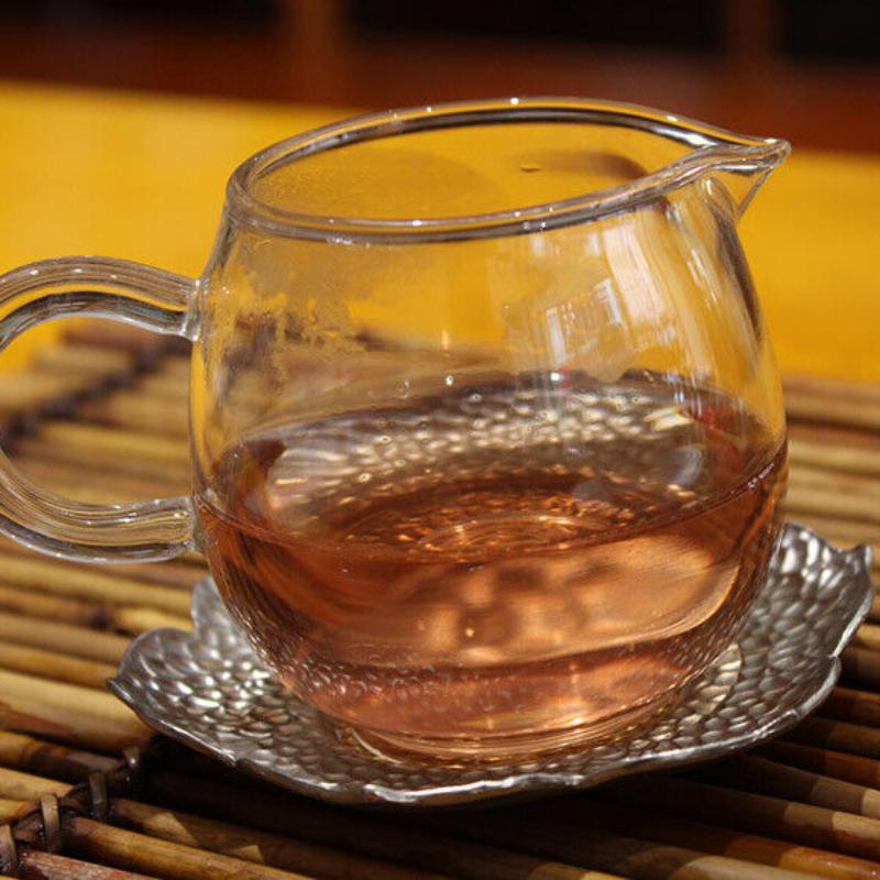 Jing Mai Zi Juan Long Zhu Pu-erh Tee Tuo 250g Roher Puer Tee Pu'er Lila Blatt